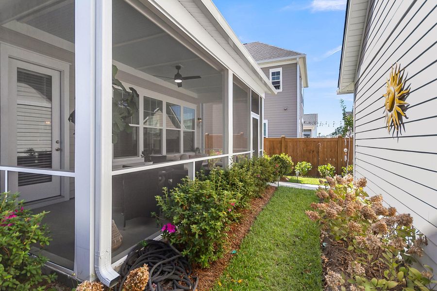 Exterior details and patio area of a home in Midtown at Nexton, Summerville (Image 28).