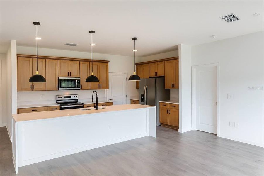 Furnished interior view inside a new home in , Kissimmee (Image 9). Furnished interior view inside a new home in , Kissimmee (Image 9).