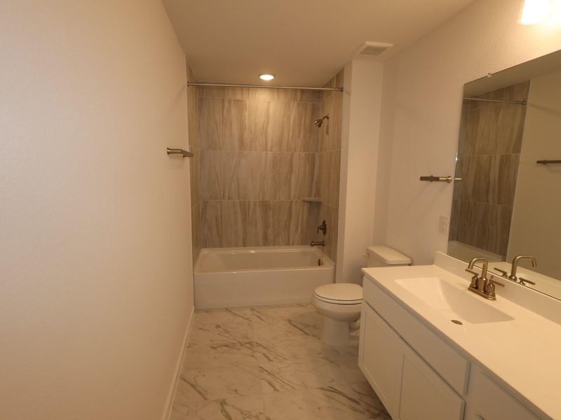 Furnished interior view inside a new home in Marvida, Cypress (Image 6).