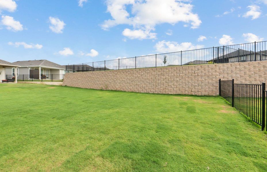 Front exterior of a new home in Sun City Texas, Georgetown, TX, highlighting curb appeal (Image 22).