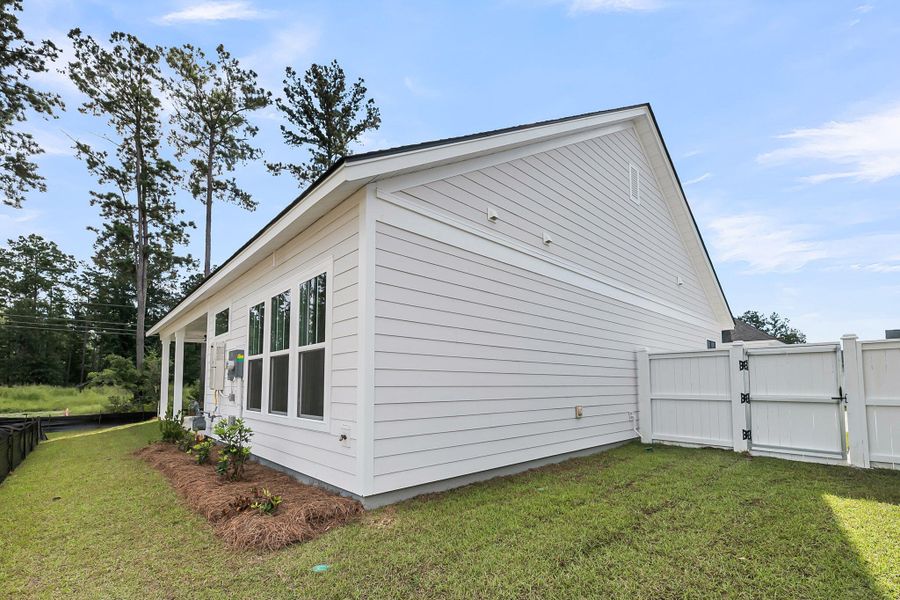 Exterior details and patio area of a home in Nexton – Midtown – The Garden Collection, Summerville (Image 26).