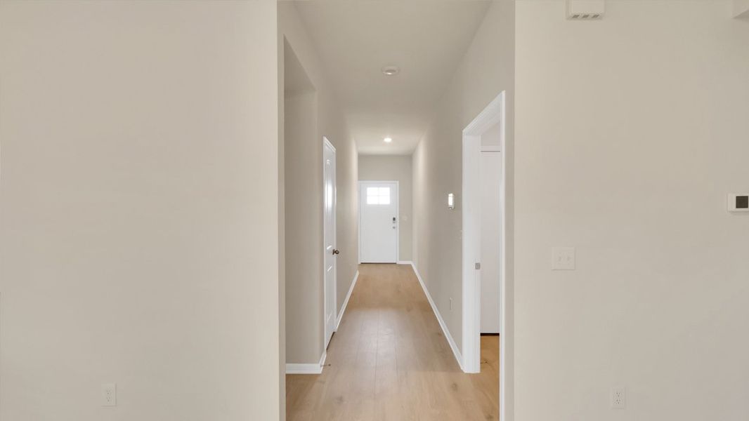 Spacious, unfurnished interior of a new home in Bar W Ranch, Leander (Image 13).