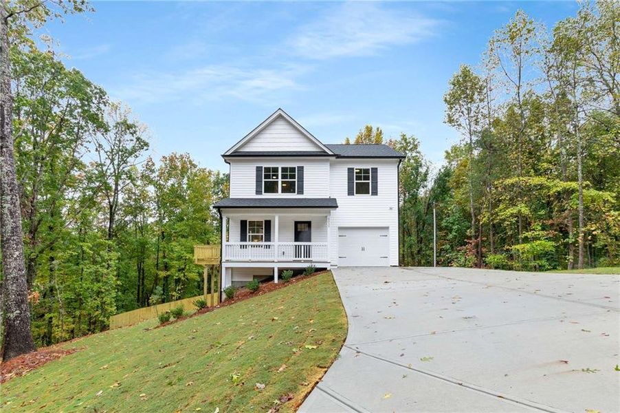 Front exterior of a new home in , Gainesville, GA, highlighting curb appeal (Image 1). Front exterior of a new home in , Gainesville, GA, highlighting curb appeal (Image 1).