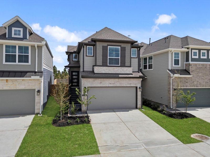 Front exterior of a new home in Bridgeland, Cypress, TX, highlighting curb appeal (Image 16).