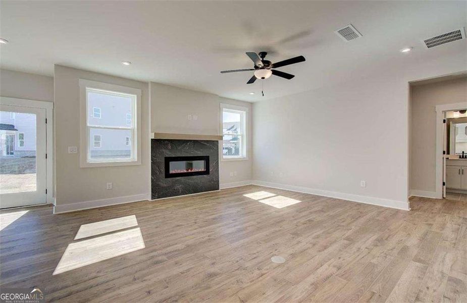 Spacious, unfurnished interior of a new home in The Paddocks at Doc Hughes, Buford (Image 42).