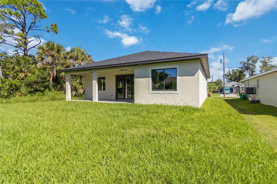 Front exterior of a new home in , Rotonda West, FL, highlighting curb appeal (Image 18).