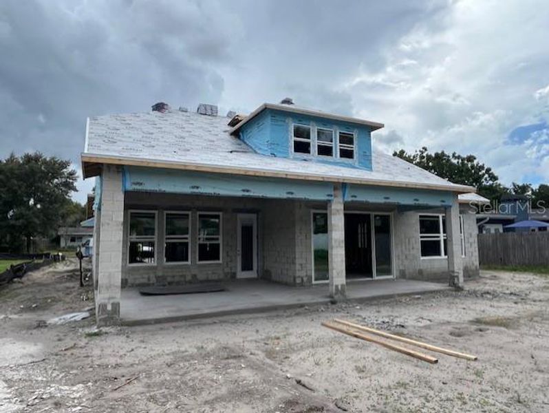 Front exterior of a new home in , Orlando, FL, highlighting curb appeal (Image 10).