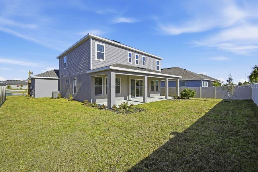 Exterior details and patio area of a home in Brookland Park, Auburndale (Image 20).