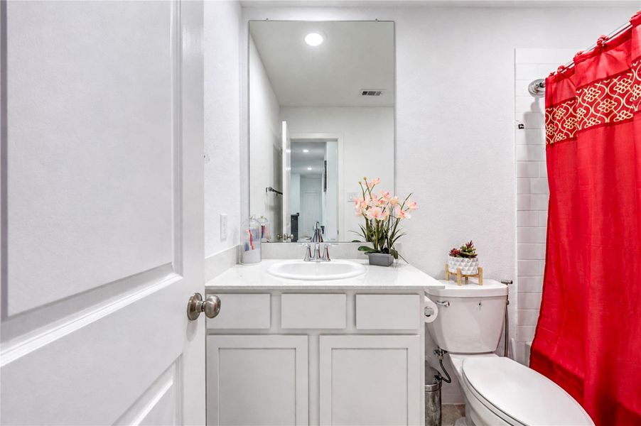 Furnished interior view inside a new home in Harvest Green, Richmond (Image 36).