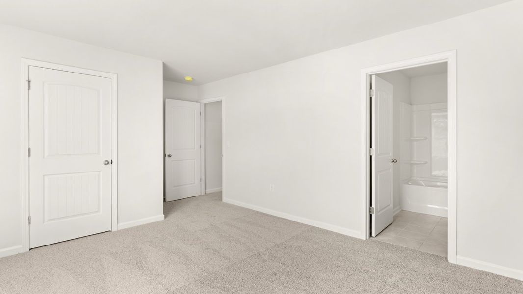 Representative unfurnished interior of a home built from the Mansfield by D.R. Horton in Falcon Landing, Gainesville (Image 26).