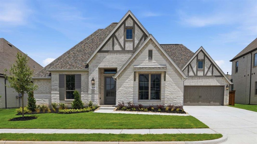 Front exterior of a new home in Terraces, Rockwall, TX, highlighting curb appeal (Image 1). Front exterior of a new home in Terraces, Rockwall, TX, highlighting curb appeal (Image 1).