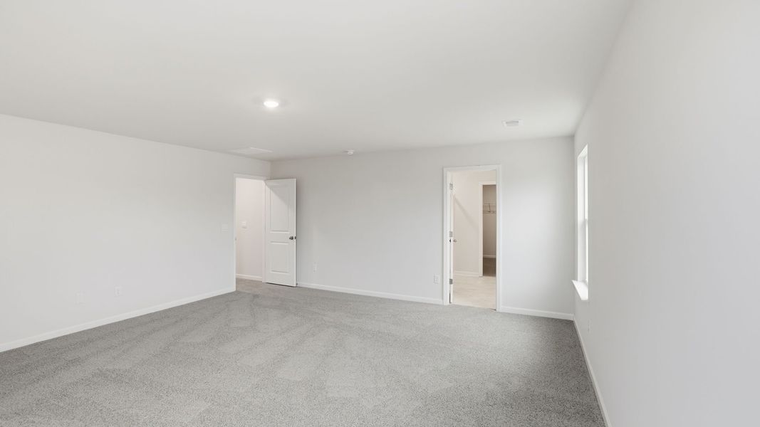 Spacious, unfurnished interior of a new home in Durbin Meadows Traditions, Fountain Inn (Image 30).