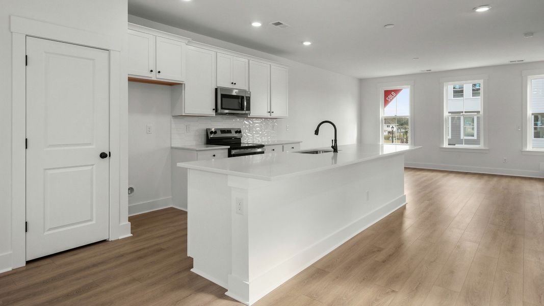 Furnished interior view inside a new home in Seabreeze Crossing, Little River (Image 11).