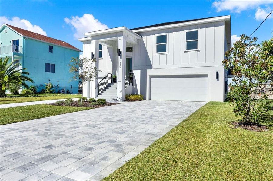 Front exterior of a new home in , Hernando Beach, FL, highlighting curb appeal (Image 1).
