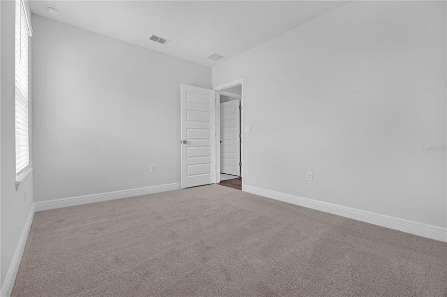 Spacious, unfurnished interior of a new home in Waterleigh, Winter Garden (Image 36).
