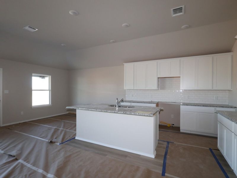 In-progress construction of a new home in Carillon, Manor, TX (Image 13).