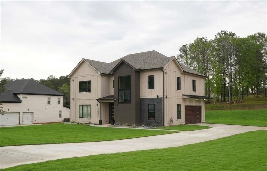 Front exterior of a new home in , Fayetteville, GA, highlighting curb appeal (Image 24).