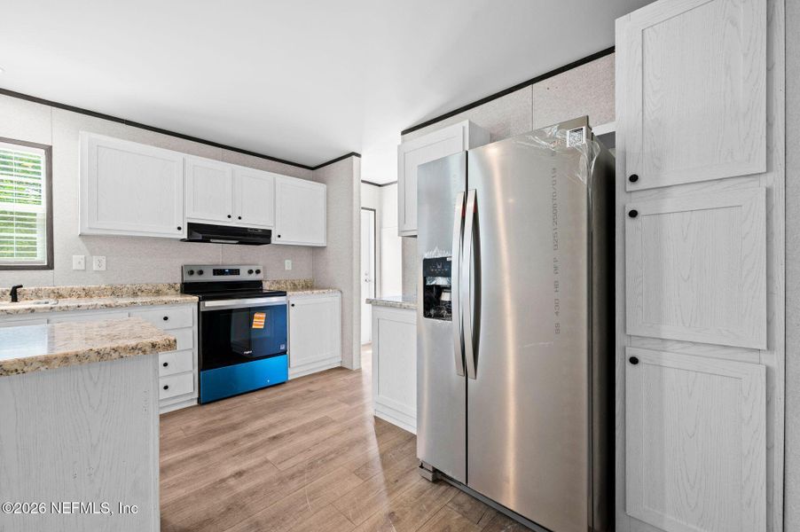 Furnished interior view inside a new home in , Lake City (Image 5).