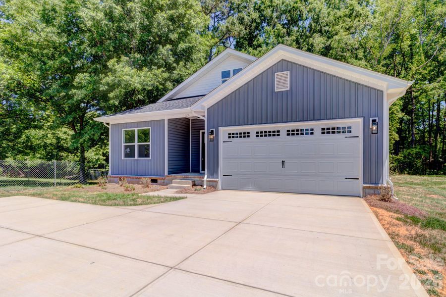 Front exterior of a new home in , Cherryville, NC, highlighting curb appeal (Image 18).