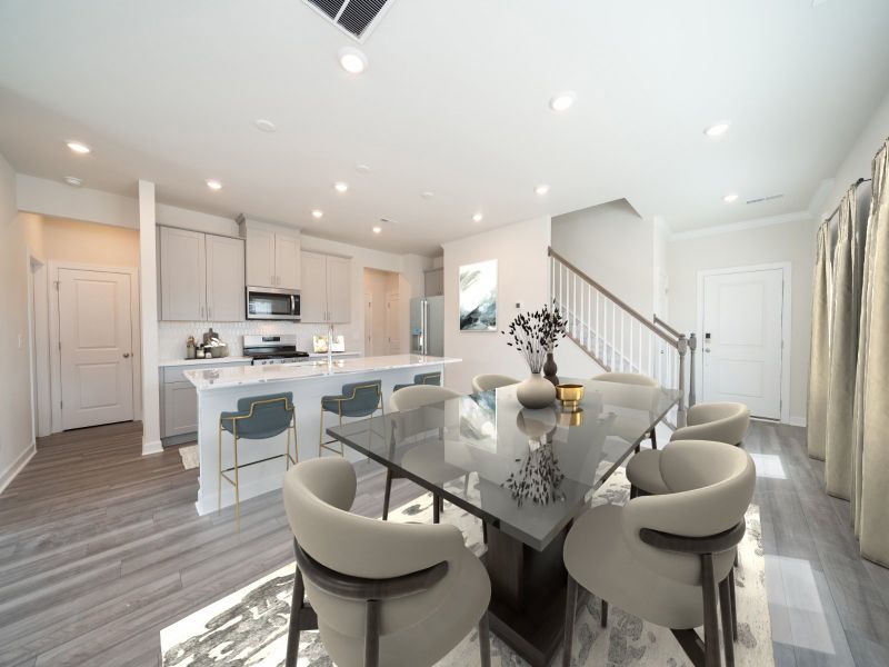 Dining area in the Roswell floorplan at a Meritage Homes community in Garner, NC.