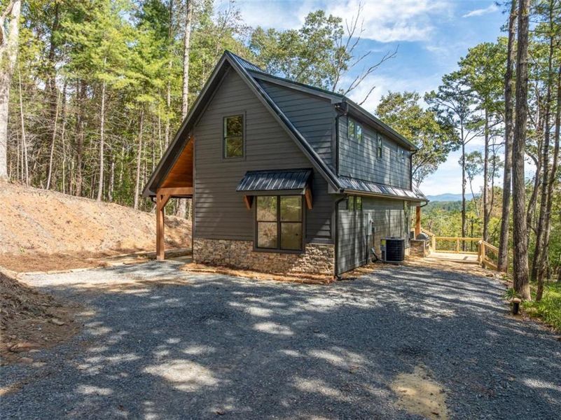 Exterior details and patio area of a home in , Ellijay (Image 3).