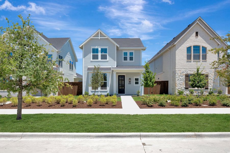 Front exterior of a new home in Walsh Cottage, Fort Worth, TX, highlighting curb appeal (Image 1). Front exterior of a new home in Walsh Cottage, Fort Worth, TX, highlighting curb appeal (Image 1).