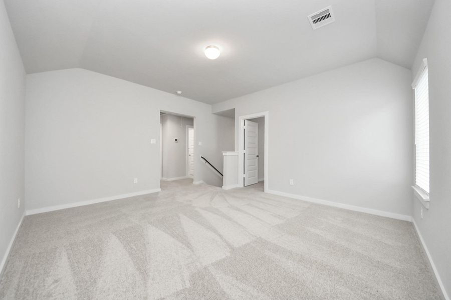 Ascend to relaxation in this fantastic game room! Ideal for both casual gatherings and adult gaming, it boasts plush carpet, lofty ceilings, custom paint, and ample windows for abundant natural light. Ascend to relaxation in this fantastic game room! Ideal for both casual gatherings and adult gaming, it boasts plush carpet, lofty ceilings, custom paint, and ample windows for abundant natural light.