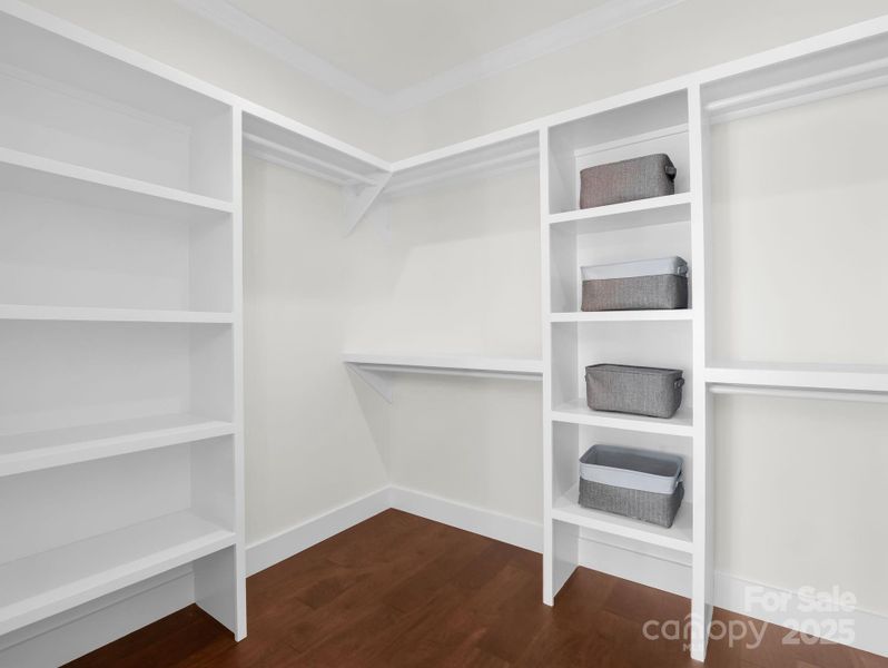 Spacious primary walk-in closet