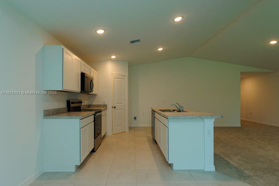 Furnished interior view inside a new home in , Lehigh Acres (Image 3). Furnished interior view inside a new home in , Lehigh Acres (Image 3).