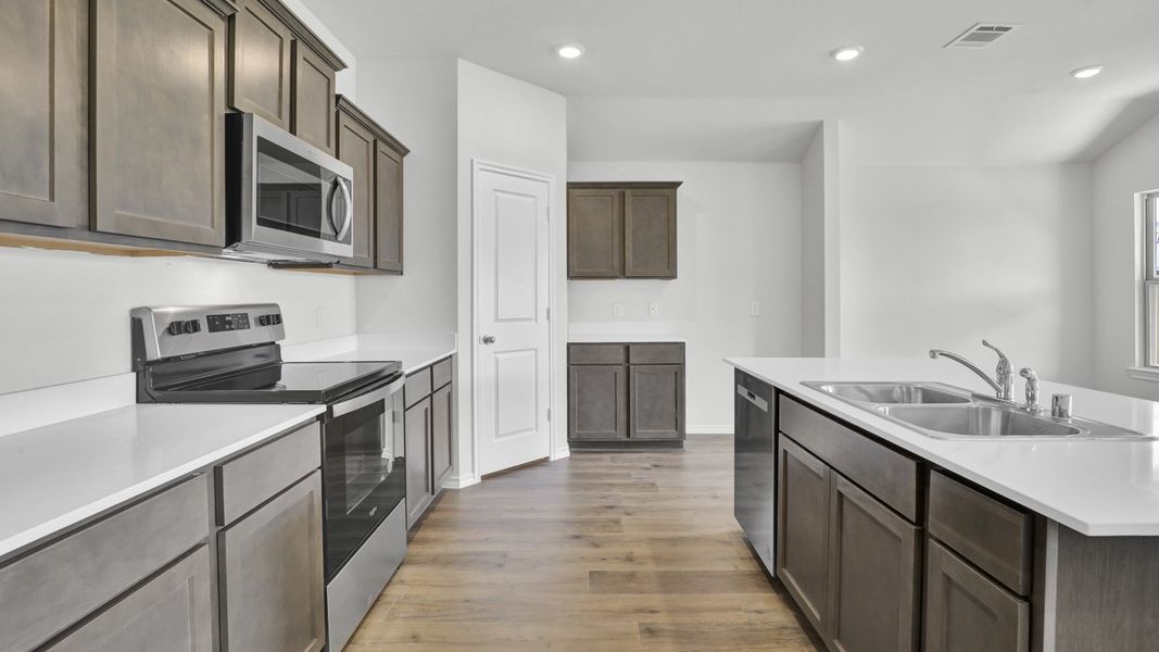 Furnished interior view inside a new home in Stonewyck Farms, Ennis (Image 9).