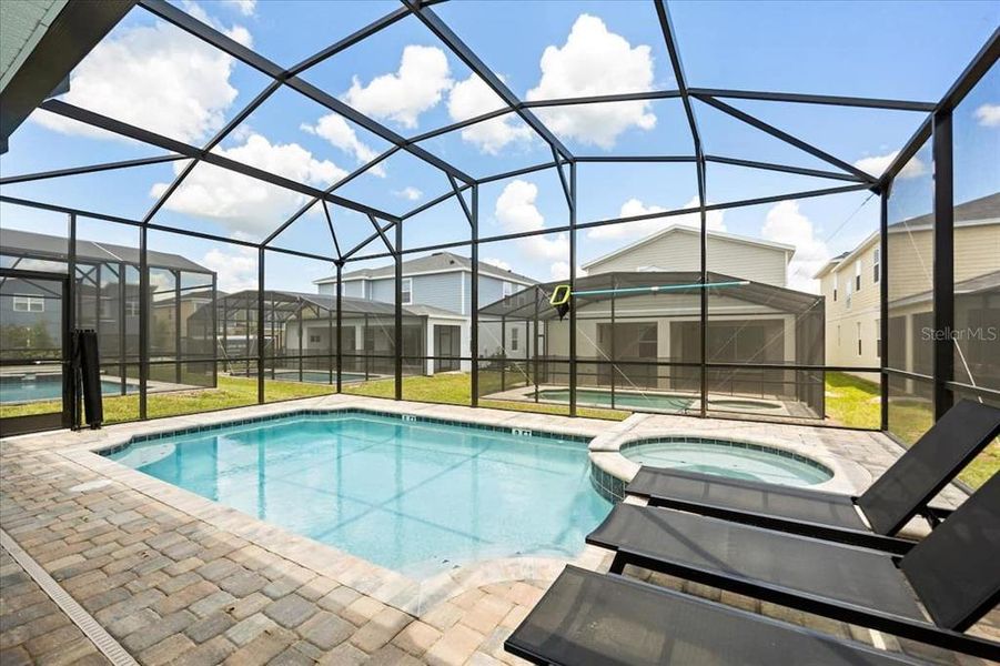 Exterior details and patio area of a home in Solara Resort, Kissimmee (Image 3).
