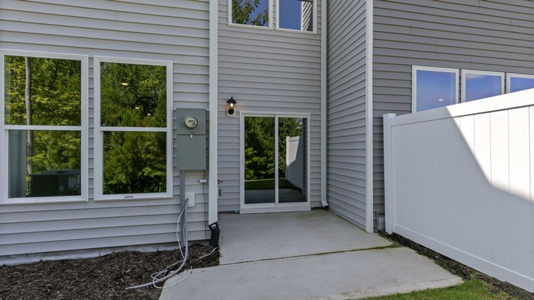 Exterior details and patio area of a home in Chapel Townes, Raleigh (Image 18). Exterior details and patio area of a home in Chapel Townes, Raleigh (Image 18).