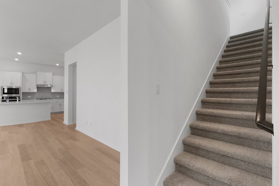 Representative unfurnished interior of a home built from the Annie by Chesmar Homes in Nolina, Georgetown (Image 11).