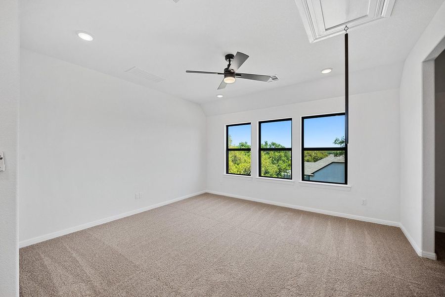 Carpeted empty room with baseboards, ceiling fan, recessed lighting, and attic access Carpeted empty room with baseboards, ceiling fan, recessed lighting, and attic access