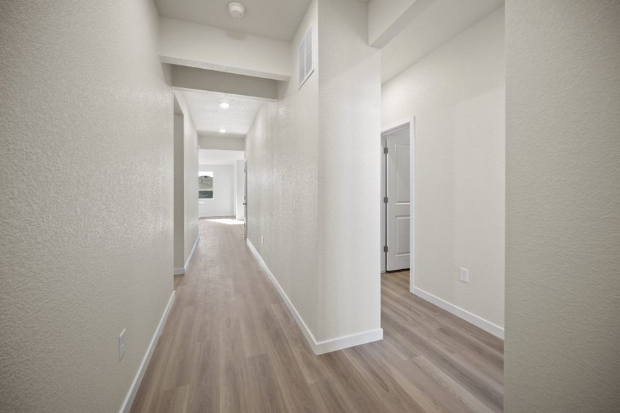 Representative unfurnished interior of a home built from the Juniper by View Homes in Aspen Ranch, Fountain (Image 13).