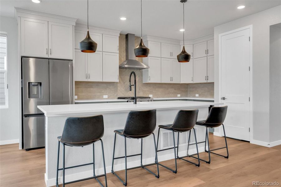 High-end appliance package and designer-selected materials throughout.