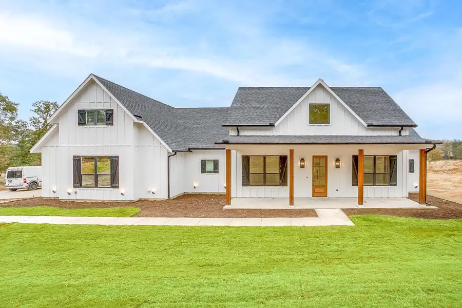 Representative exterior photo of a completed home built from the Erin by Trinity Classic Homes in The Reserve at Shadle, Poolville, TX (Image 23). Representative exterior photo of a completed home built from the Erin by Trinity Classic Homes in The Reserve at Shadle, Poolville, TX (Image 23).