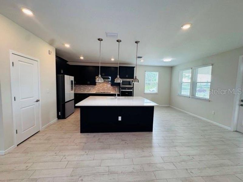 Furnished interior view inside a new home in , St. Cloud (Image 3).