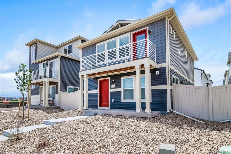 Exterior details and patio area of a home in Muegge Farms, Bennett (Image 3).