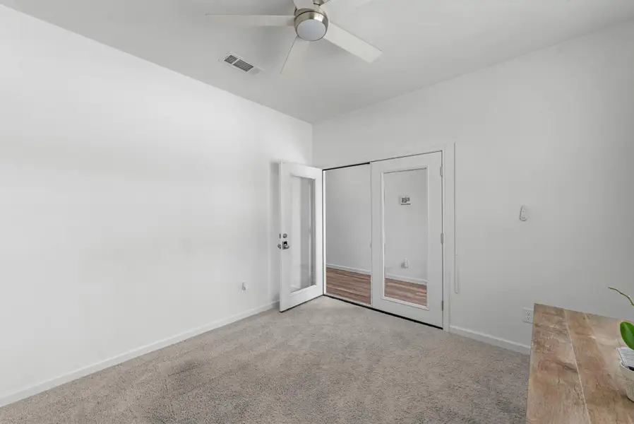 Study to the left of entry with French doors