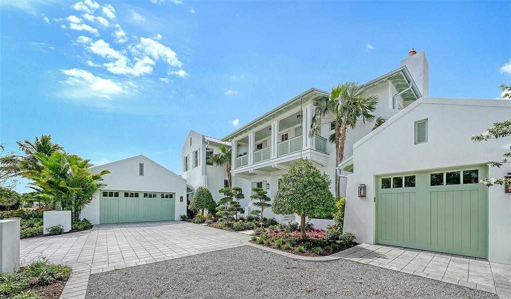 Front exterior of a new home in , Longboat Key, FL, highlighting curb appeal (Image 23). Front exterior of a new home in , Longboat Key, FL, highlighting curb appeal (Image 23).