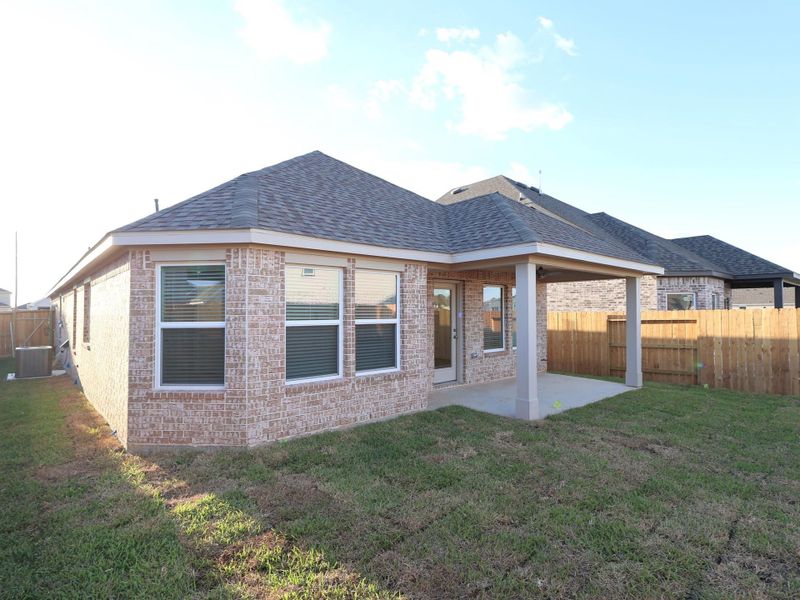 Exterior details and patio area of a home in Marvida, Cypress (Image 3). Exterior details and patio area of a home in Marvida, Cypress (Image 3).