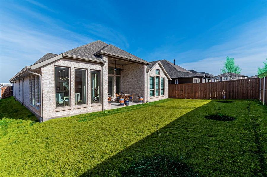 Exterior details and patio area of a home in Sweetgrass, Haslet (Image 24). Exterior details and patio area of a home in Sweetgrass, Haslet (Image 24).