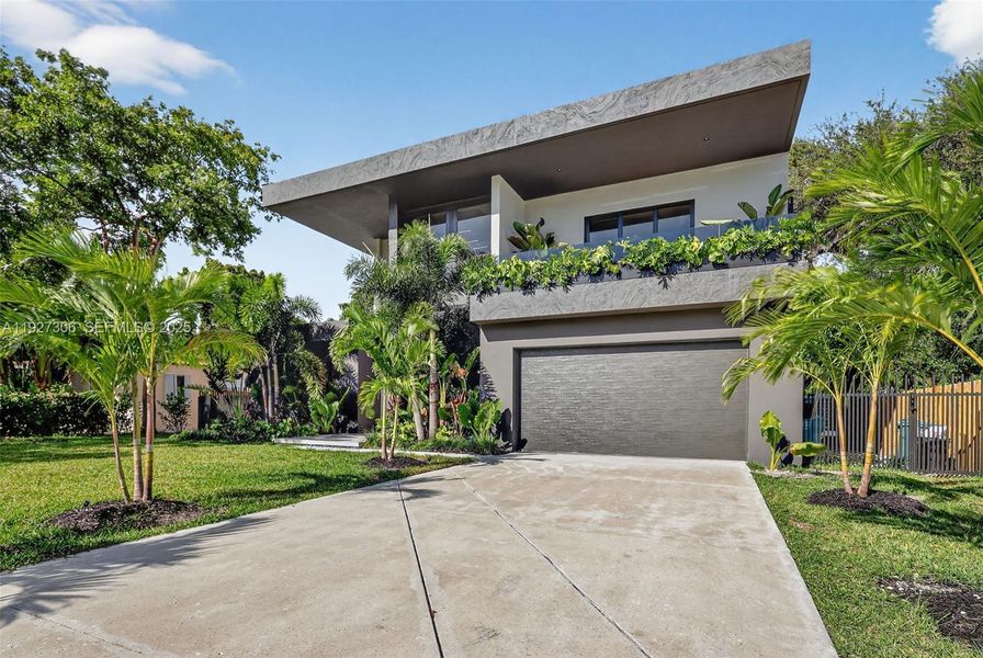 Front exterior of a new home in , Biscayne Park, FL, highlighting curb appeal (Image 2).