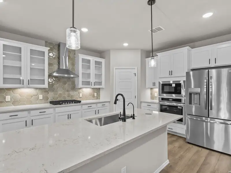 Furnished interior view inside a new home in Bricewood, San Antonio (Image 11).