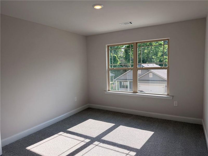 Spacious, unfurnished interior of a new home in Magnolia Villas, Cornelia (Image 21).