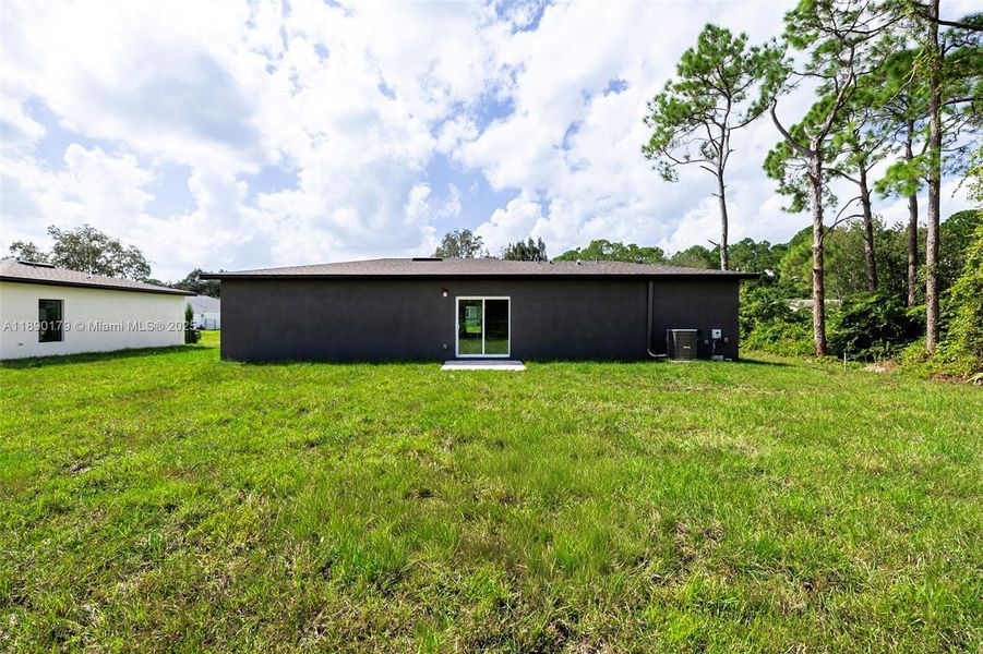 Exterior details and patio area of a home in , Palm Bay (Image 2). Exterior details and patio area of a home in , Palm Bay (Image 2).