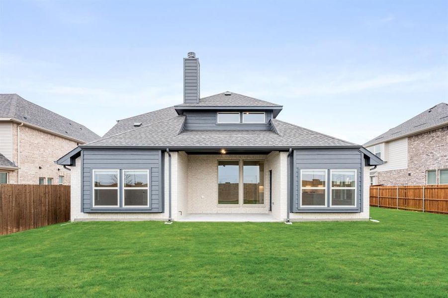 Exterior details and patio area of a home in Villages of Hurricane Creek, Anna (Image 24).