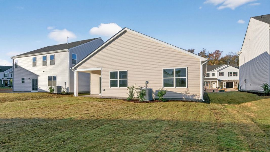 Exterior details and patio area of a home in Honeycutt Oaks, Angier (Image 4). Exterior details and patio area of a home in Honeycutt Oaks, Angier (Image 4).