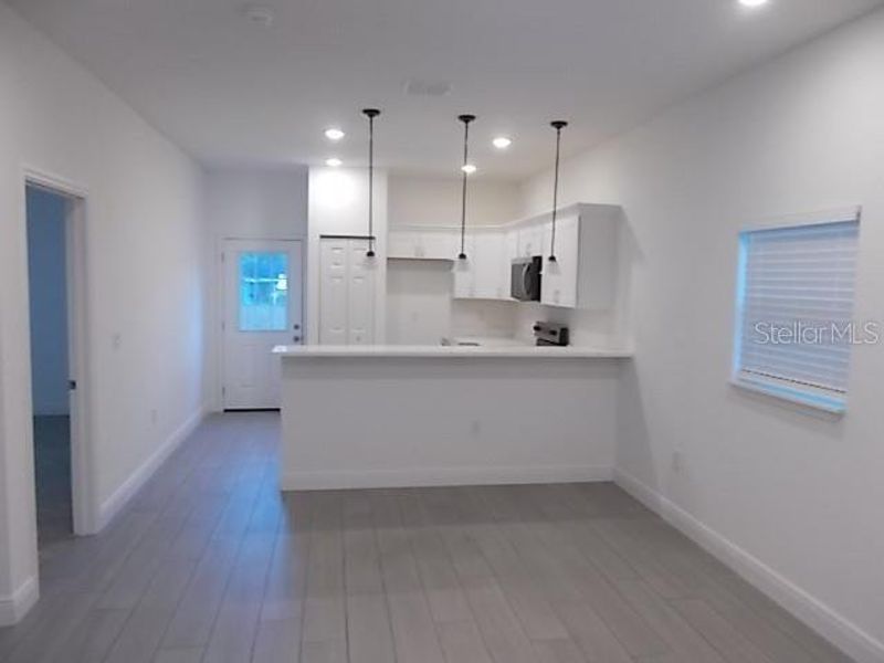 Furnished interior view inside a new home in , Daytona Beach (Image 8).